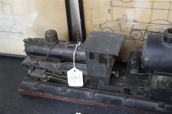 A scratchbuilt model of a 262 steam powered locomotive and tender,